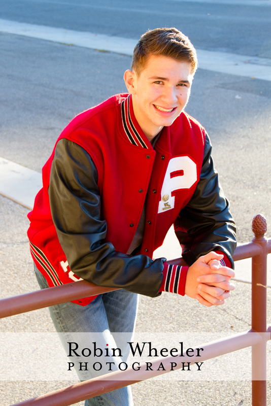 Senior photo of a boy with a Payette High School letterman jacket, Ontario, Oregon