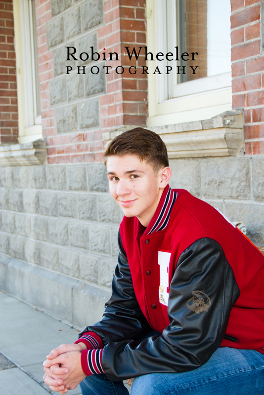 Senior photo of a boy with a Payette High School letterman jacket, Ontario, Oregon