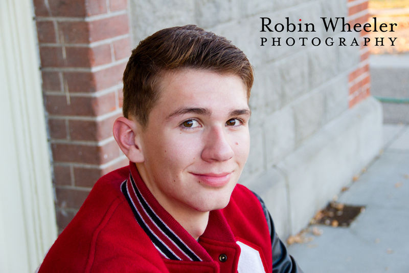 Senior photo of a boy with a Payette High School letterman jacket, Ontario, Oregon