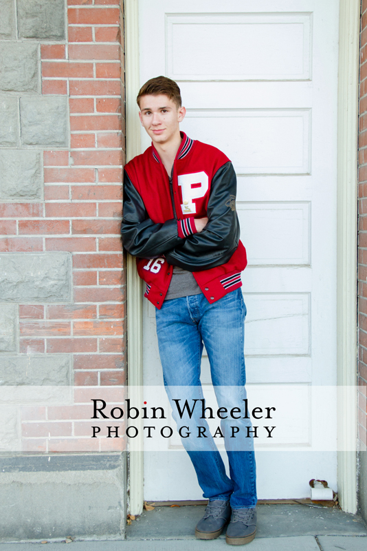 Senior photo of a boy with a Payette High School letterman jacket, Ontario, Oregon