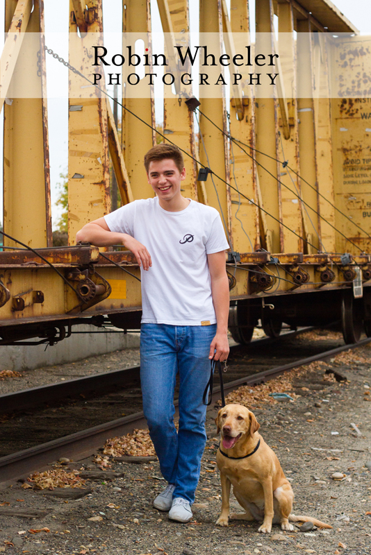 Portrait of a high school senior boy with his dog in Ontario, Oregon