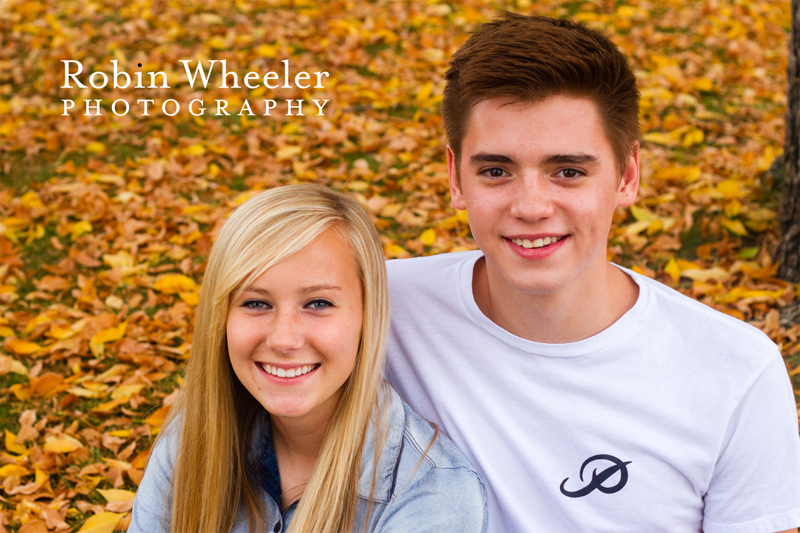 High school senior photo of boyfriend and girlfriend in autumn leaves, Ontario, Oregon