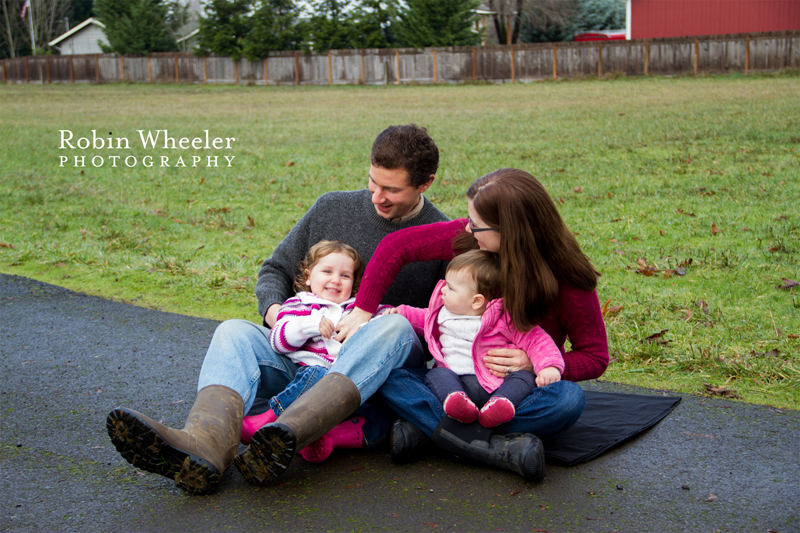 Parents tickling child, Dallas, Oregon