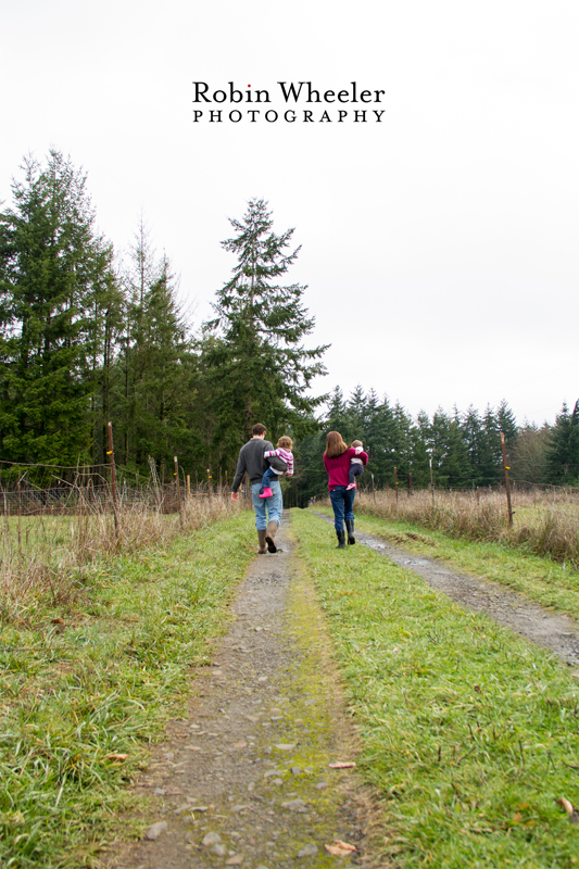 Family walking down a gravel driveway, Dallas, Oregon