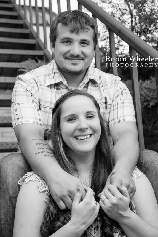 Couple sitting together on a stairway