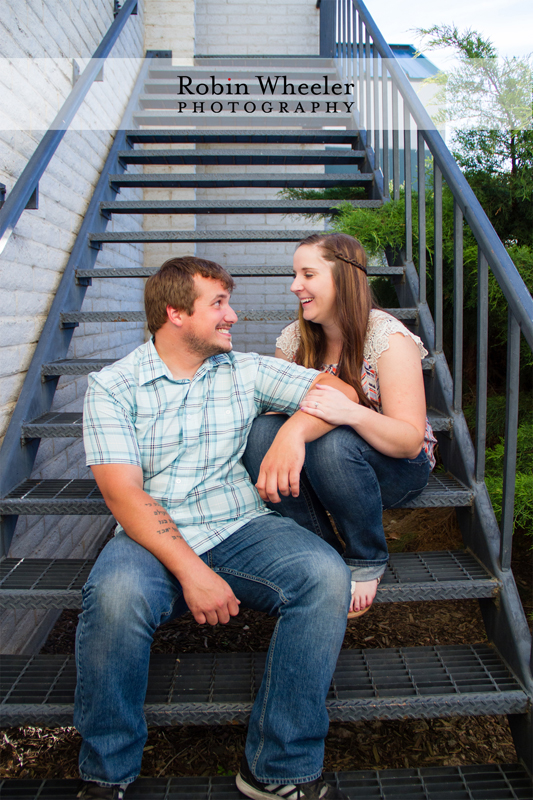 Couple sitting together on a stairway