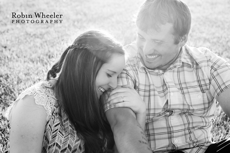 Engaged couple laughing