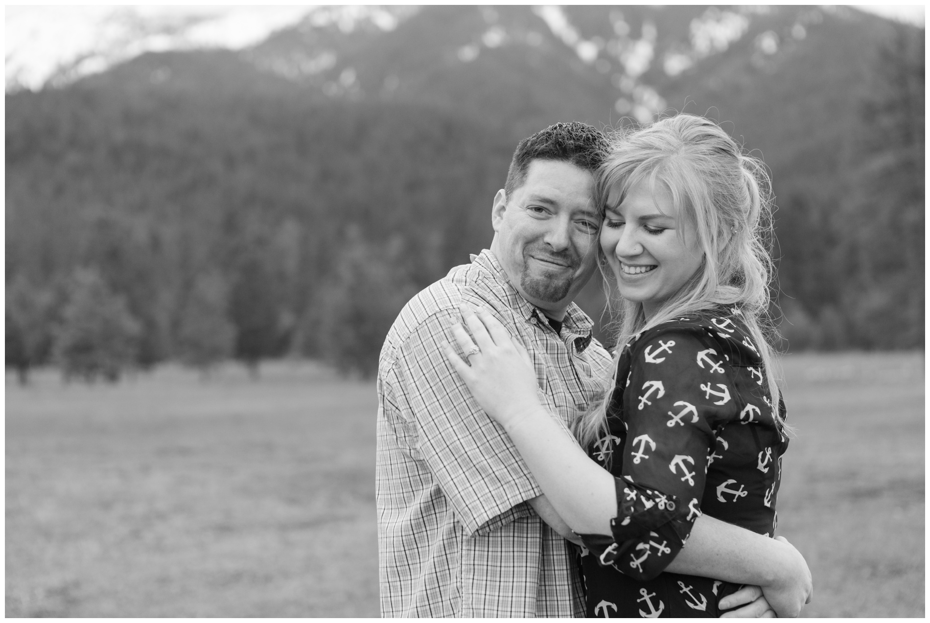 Engagement photos with Baker City, Oregon's snow-capped mountains in the background.