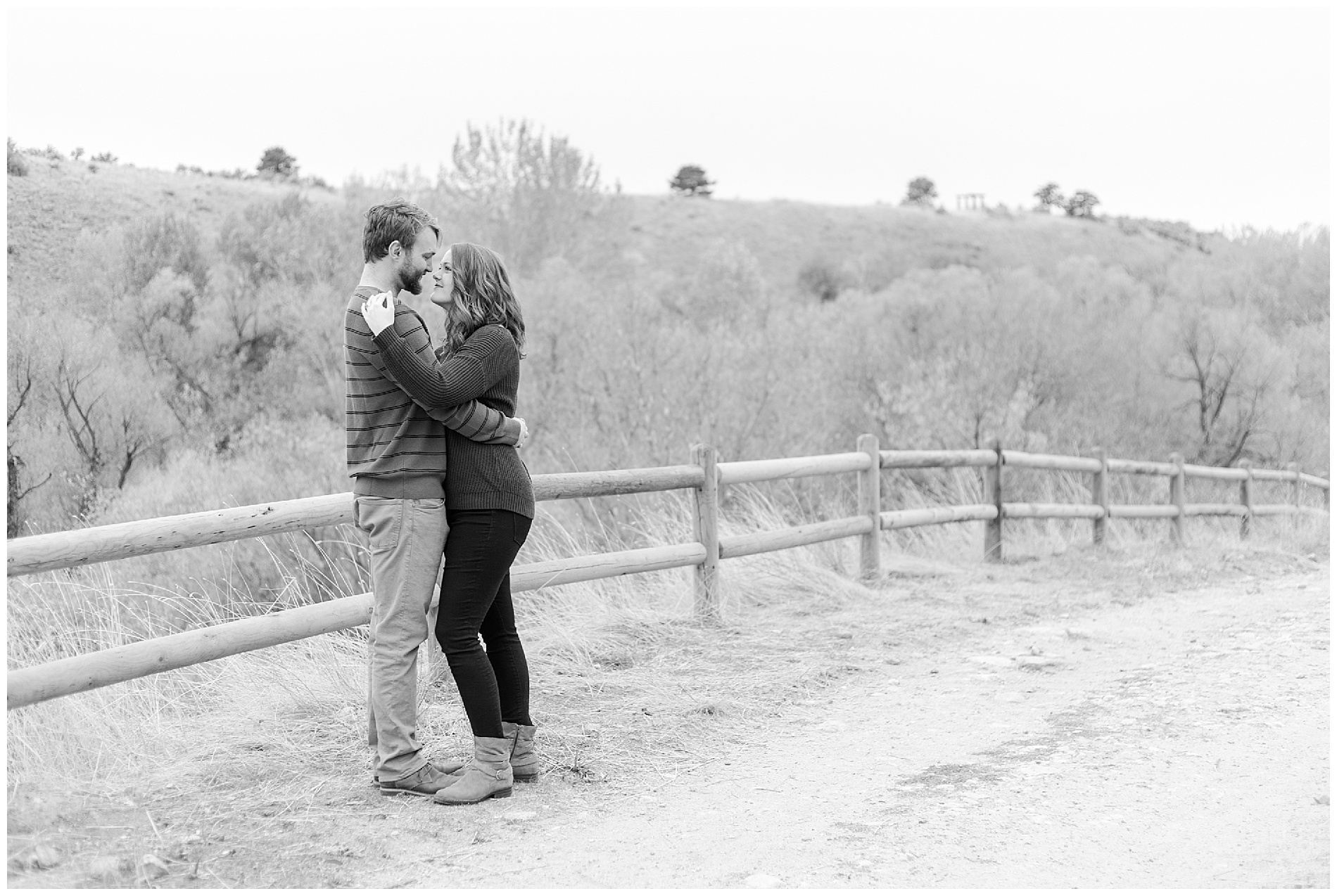 Fall engagement photos with a wooden fence in Boise's Military Reserve | Robin Wheeler Photography