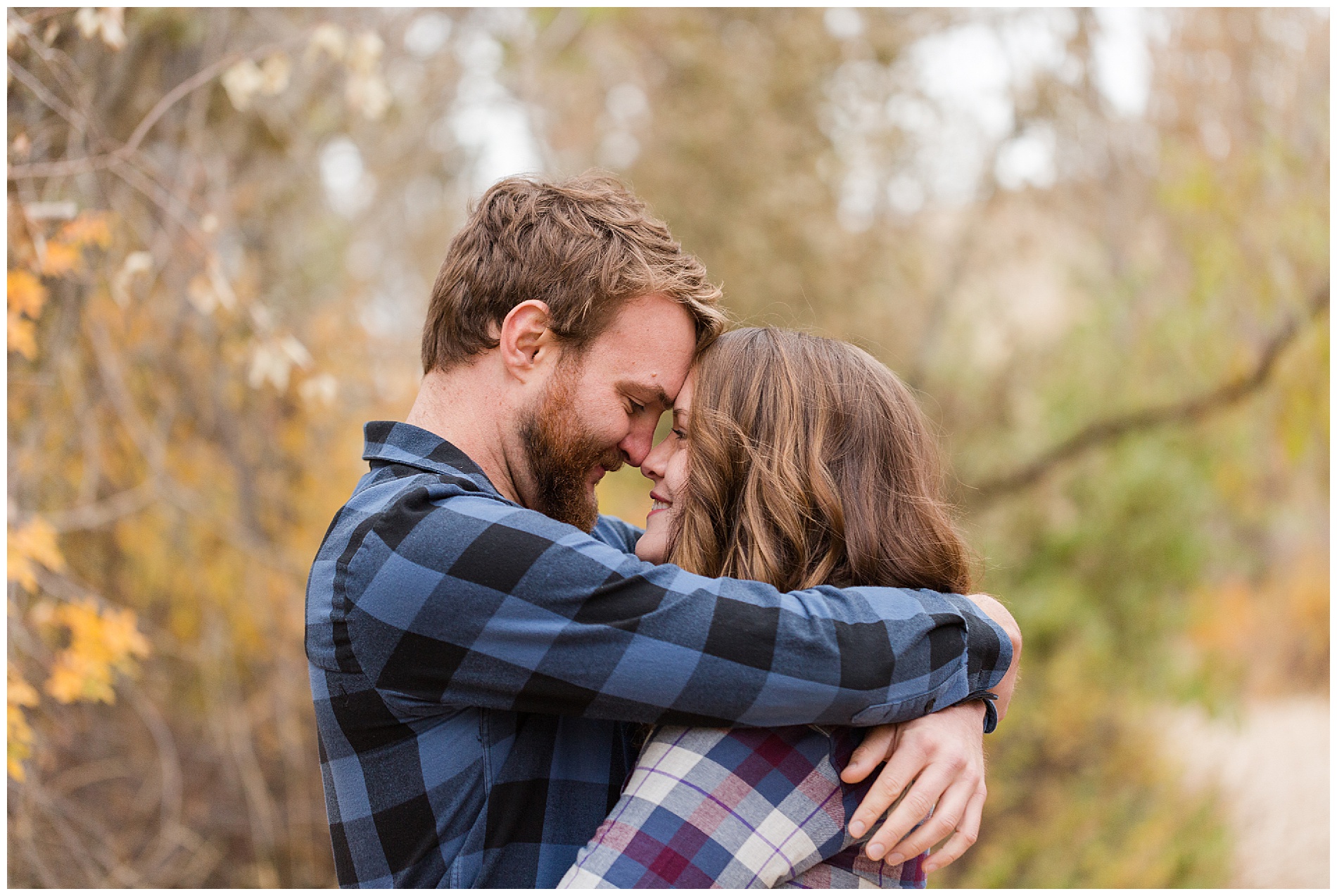 Engagement photos with autumn leaves and flannel shirts! | Robin Wheeler Photography