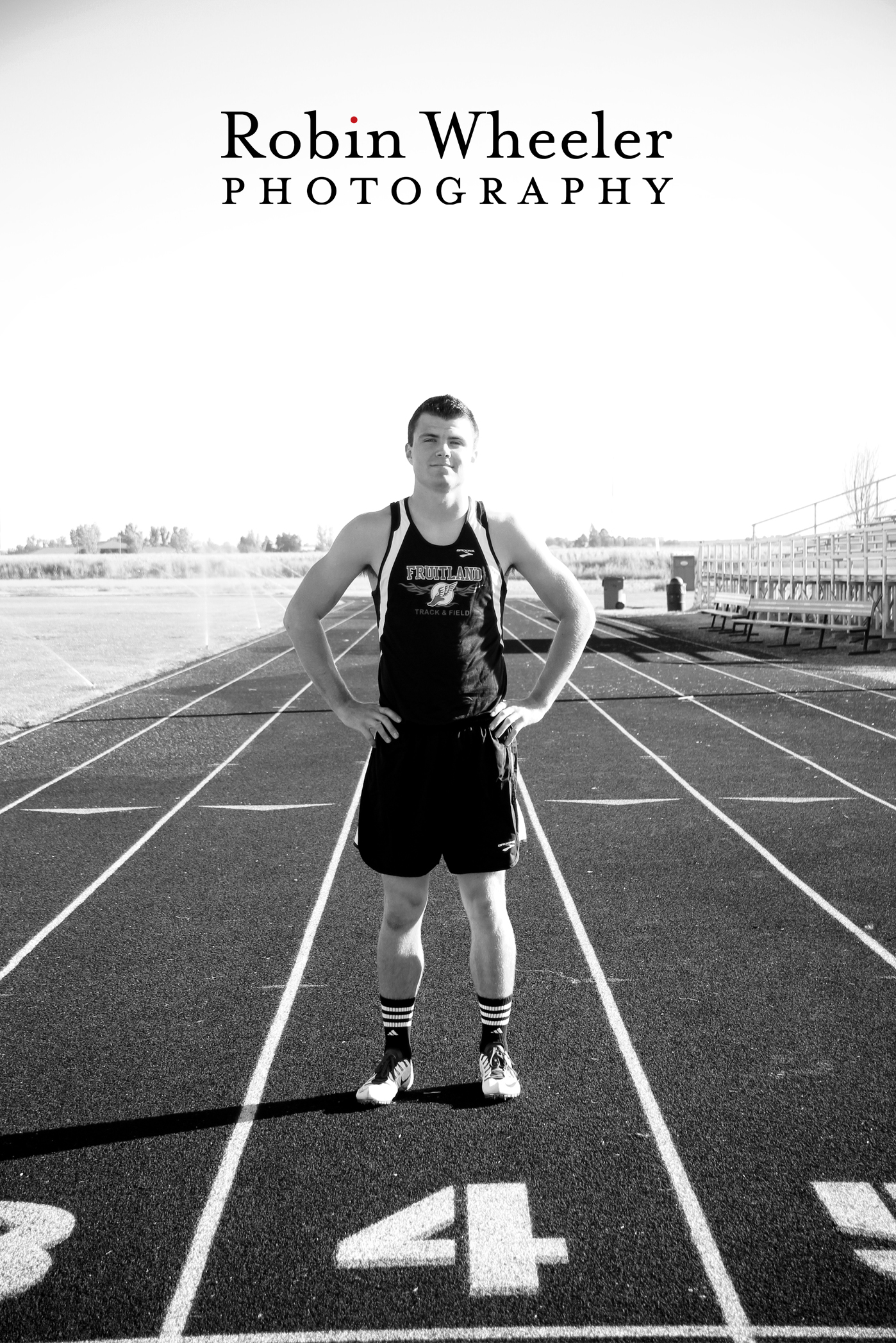 High school senior in his track uniform