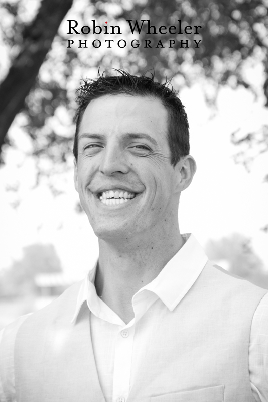 Black and white portrait of groom smiling, Ontario, Oregon