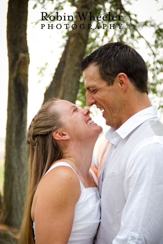 Bride and groom smiling after a kiss, Ontario, Oregon