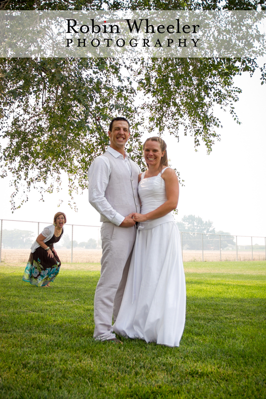 Portrait of groom and bride with friend photobombing, Ontario, Oregon