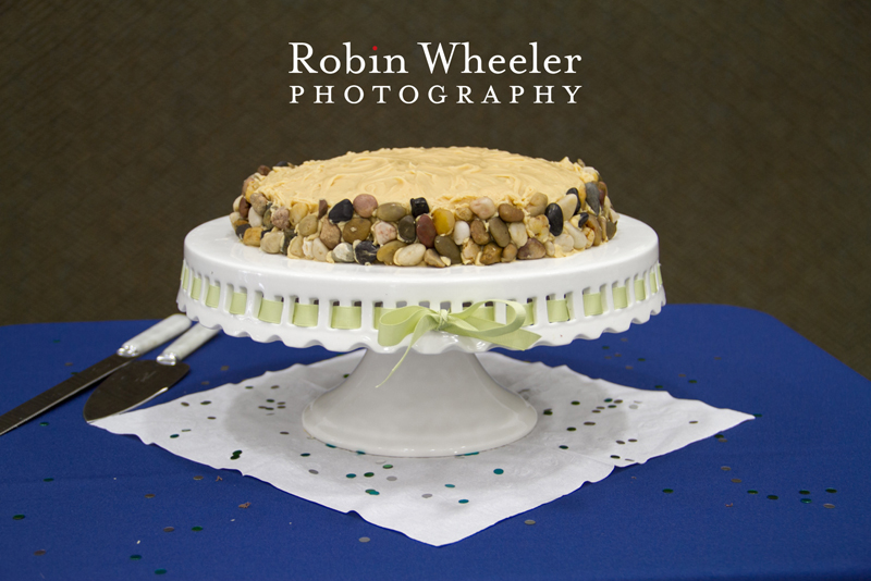 Peanut butter cake with rock decorations on a cake plate during the wedding reception, Ontario, Oregon