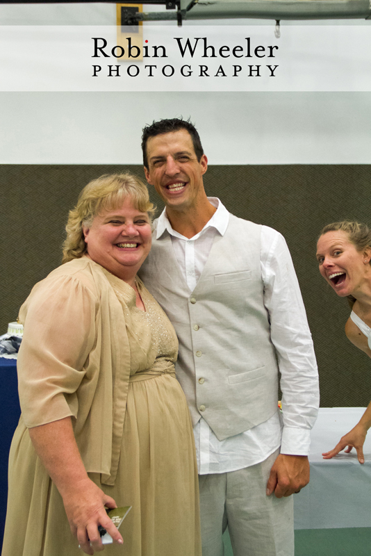 Bride photobombing a shot of her mother and the groom, Ontario, Oregon