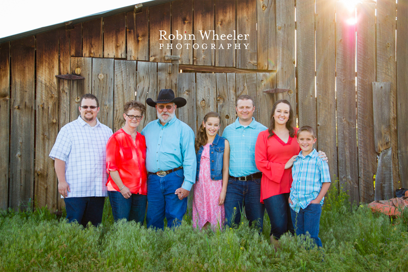 Family photo in front of a barn in Payette, Idaho
