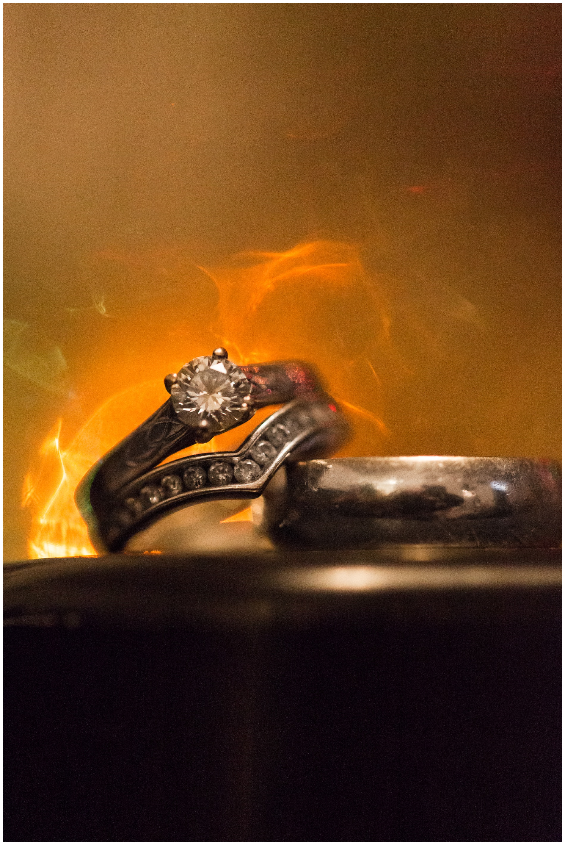 Wedding rings with bokeh that looks like fire