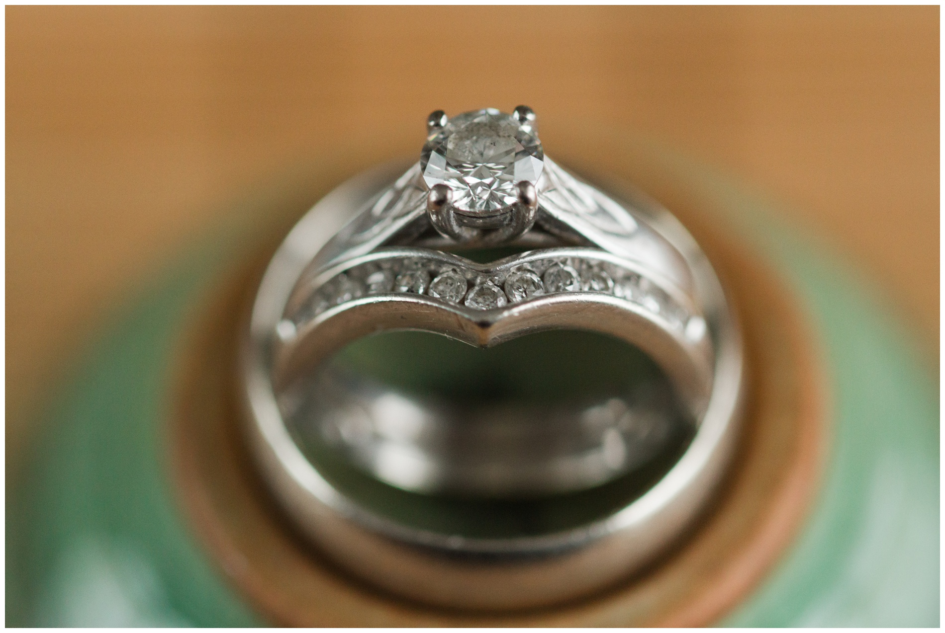 Wedding rings on a Korean celadon teacup