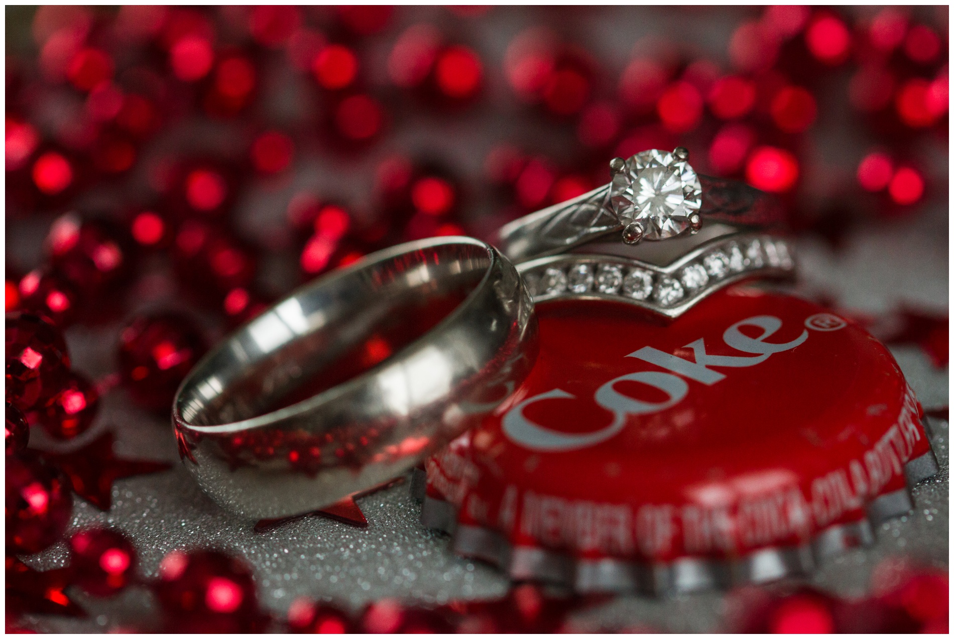 Wedding rings next to a Coke bottlecap