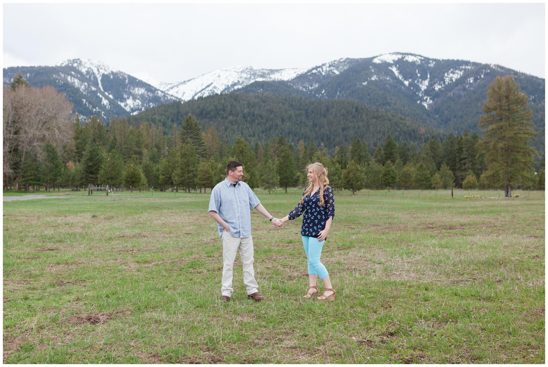 Engagement photos with Baker City, Oregon's snow-capped mountains in the background.