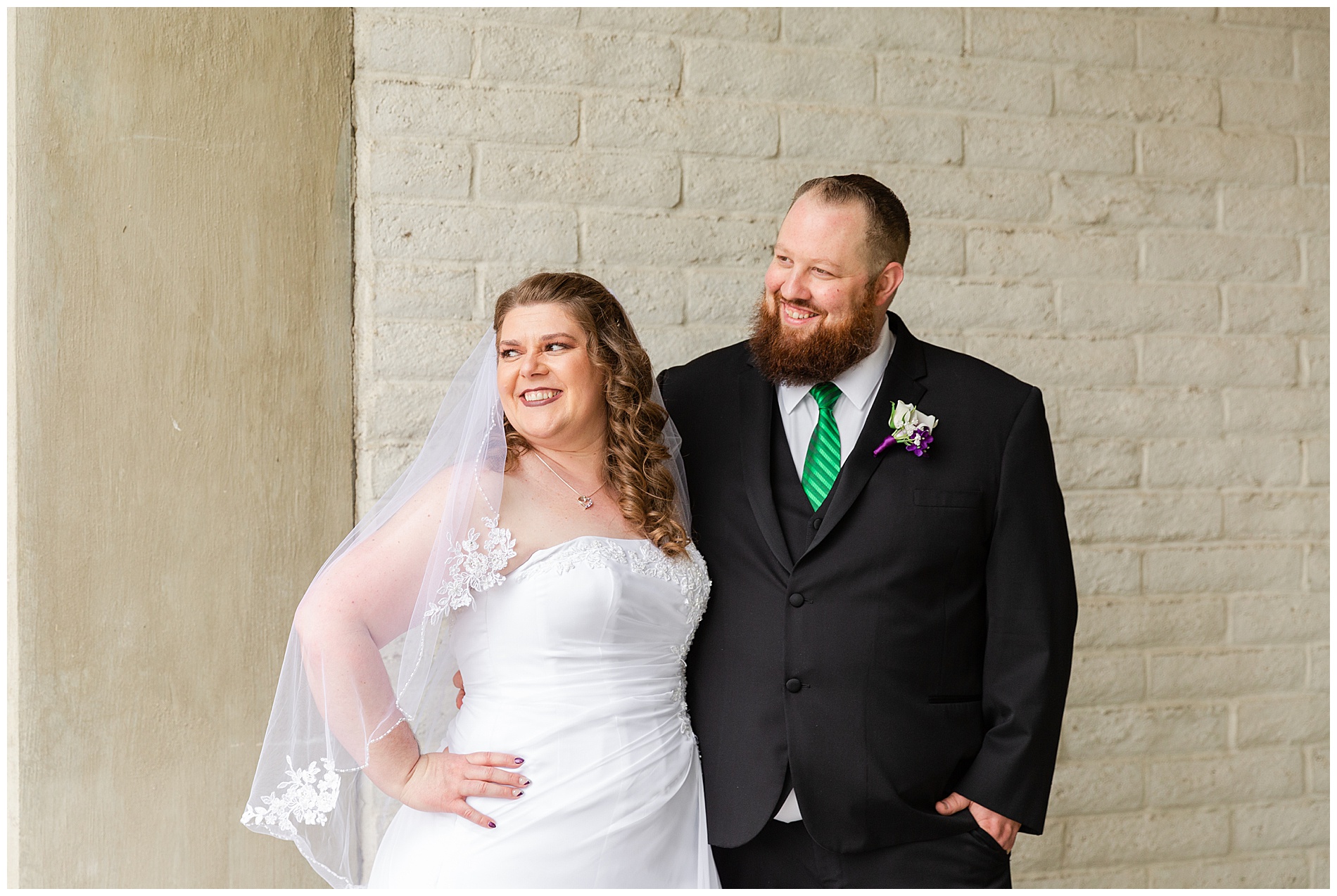 Bride and groom standing outside their church in Ontario Oregon