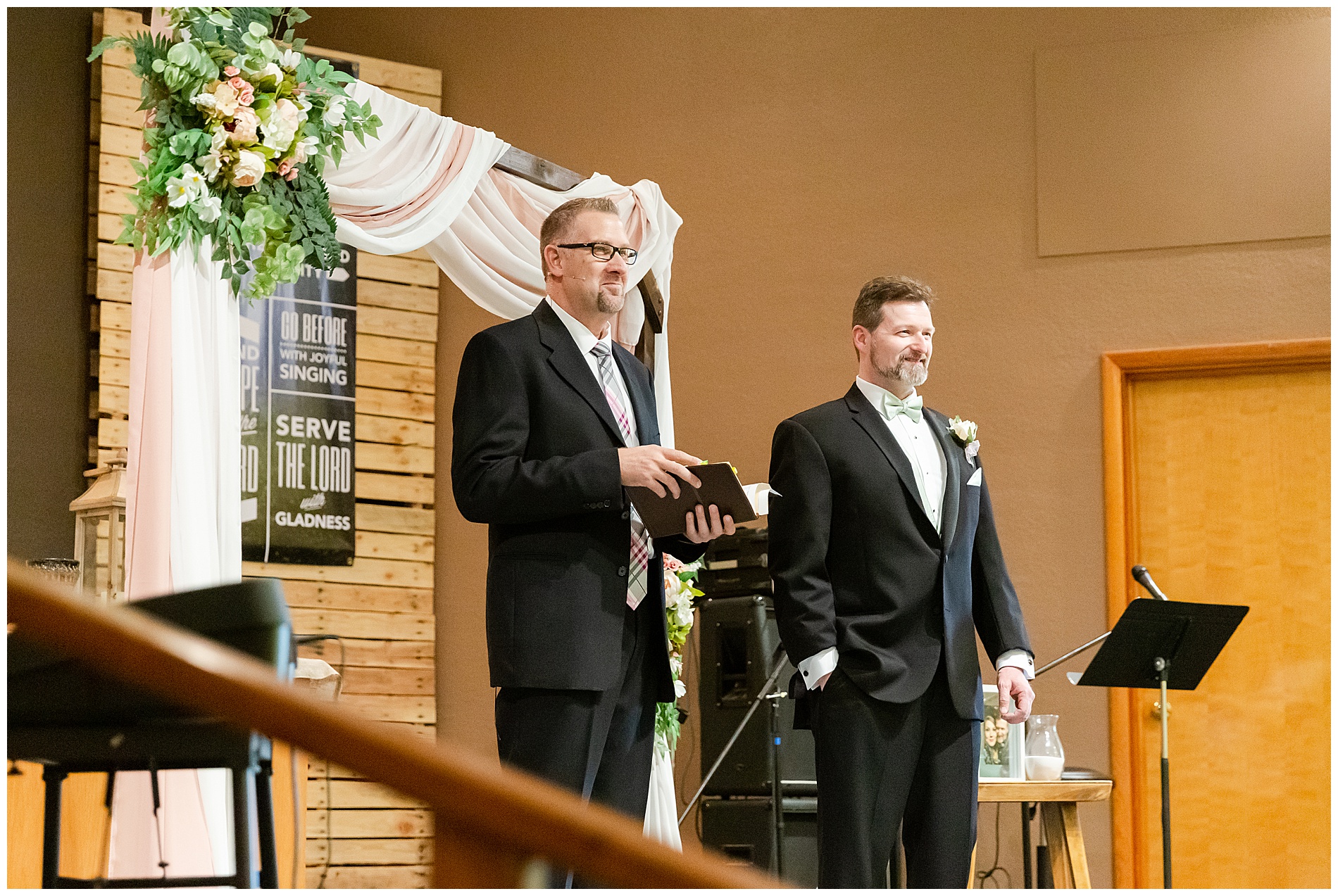 The groom and officiant wait for the bride's arrival