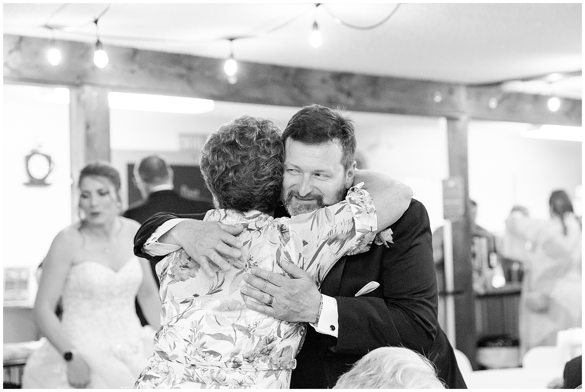 A guest greets the groom