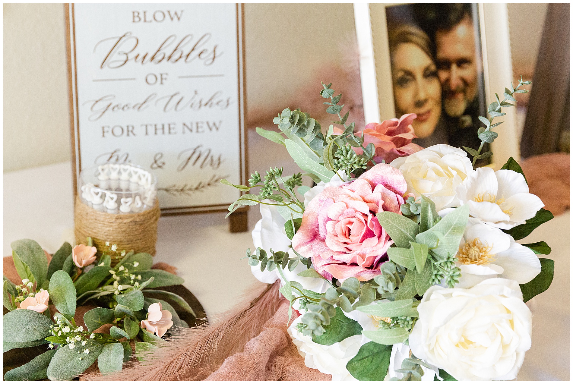 The bridal bouquet on a table at the reception