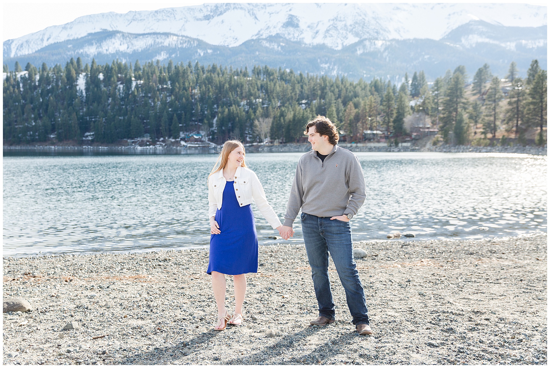 Engaged couple on the shore at Wallowa Lake Park
