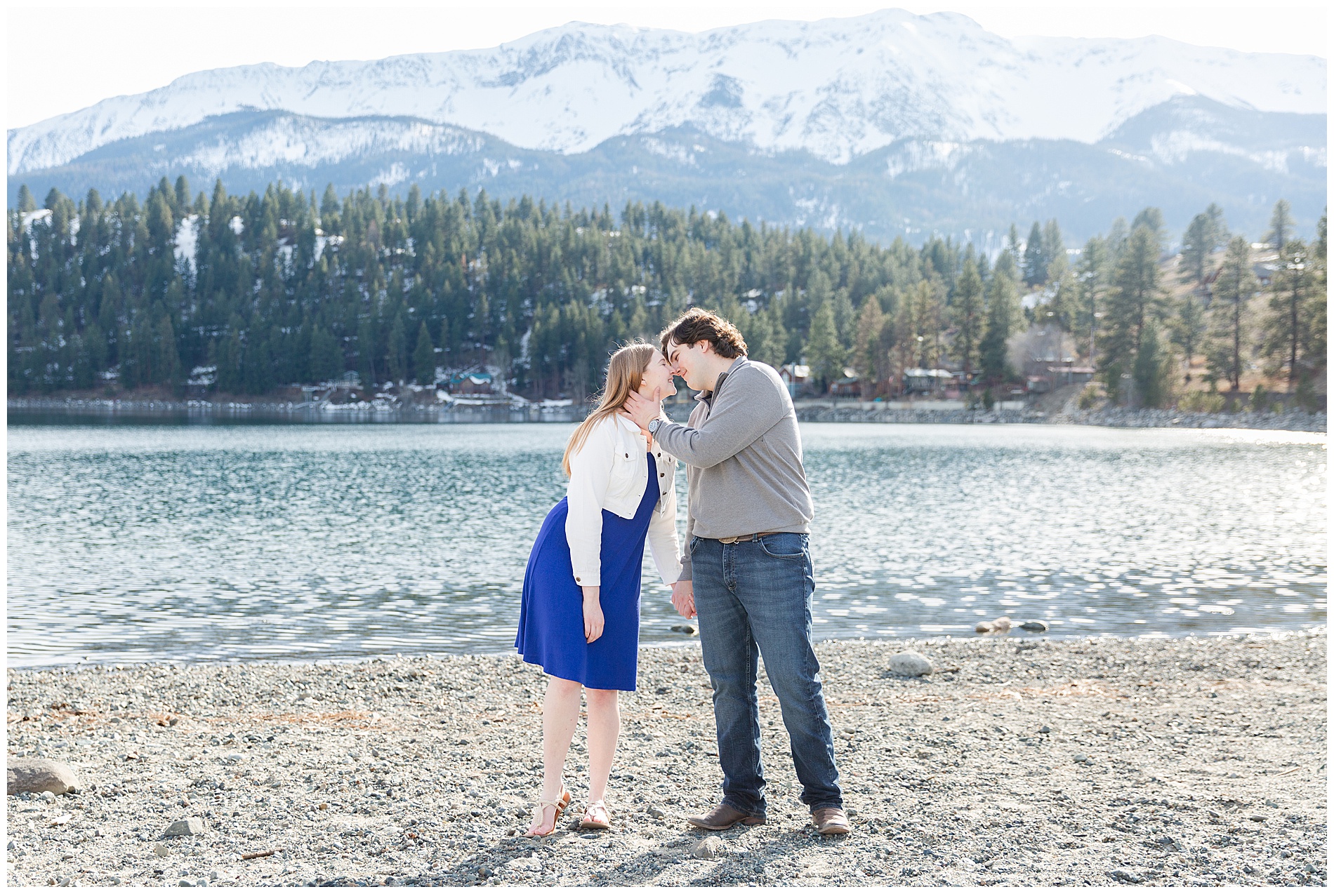 Engaged couple shares a kiss