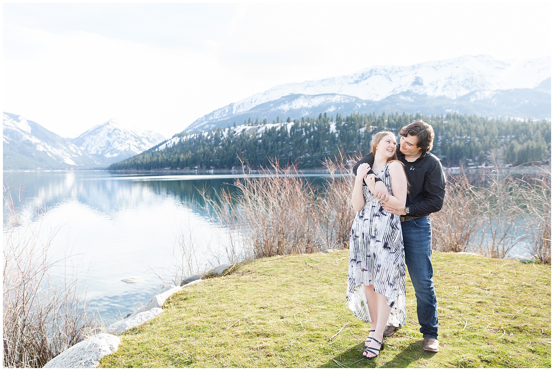 Engaged couple on the shore of Wallowa Lake