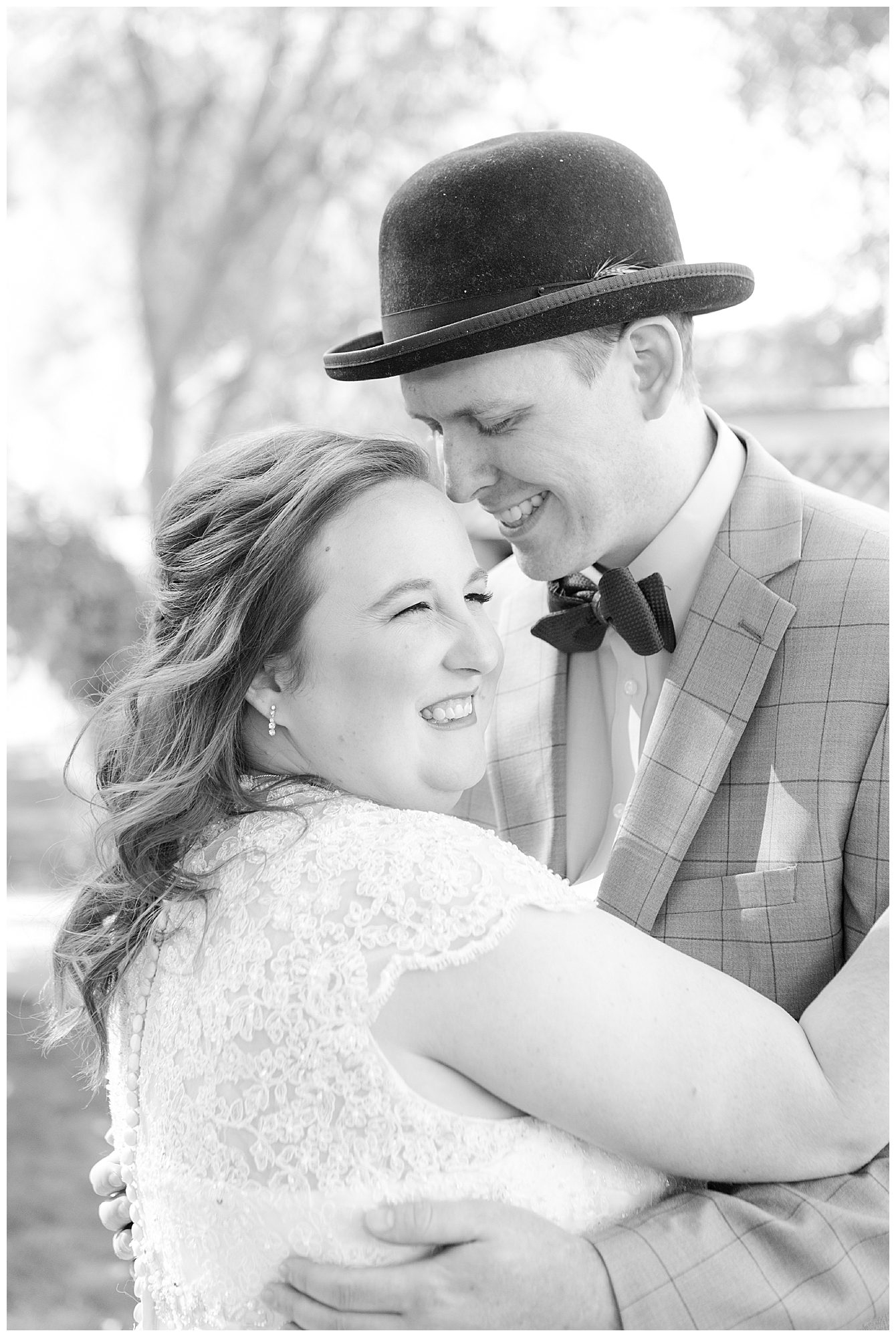 Close up of the bride and groom's faces as they embrace