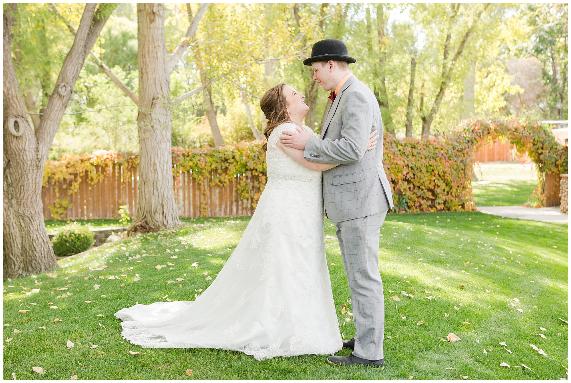 The bride and groom embrace at an outdoor fall wedding in Nampa, Idaho