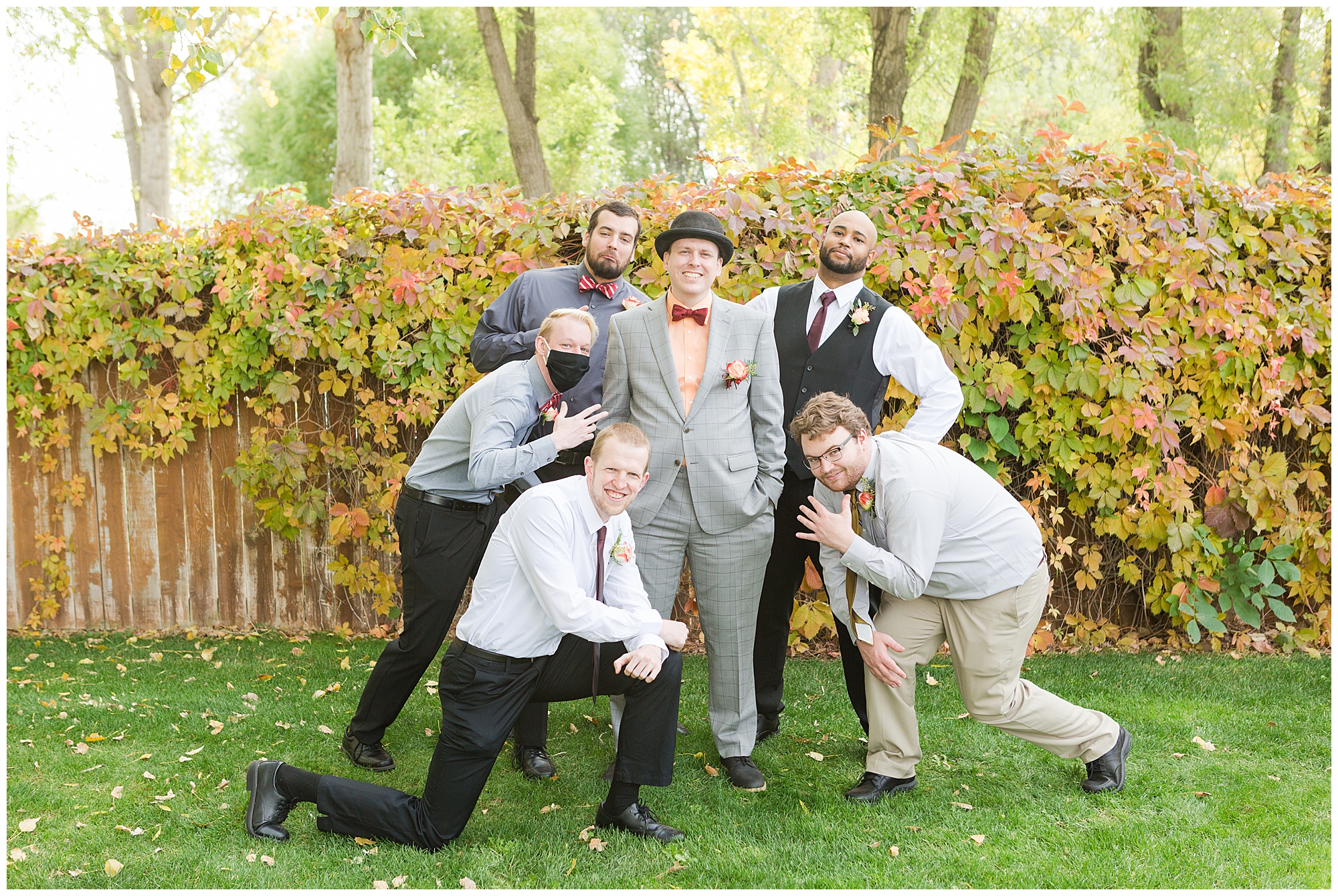 Groomsmen strike a pose with the groom