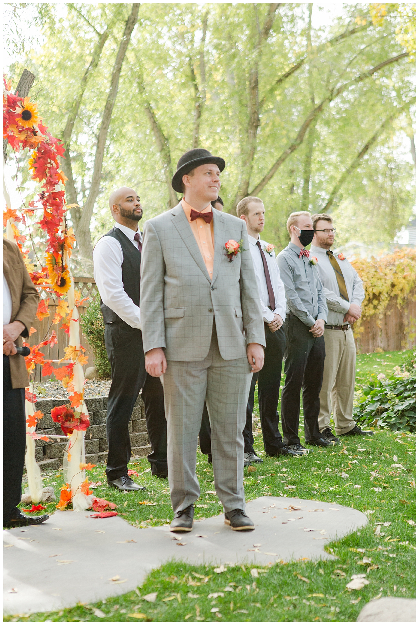 The groom sees his bride coming down the aisle during the ceremony