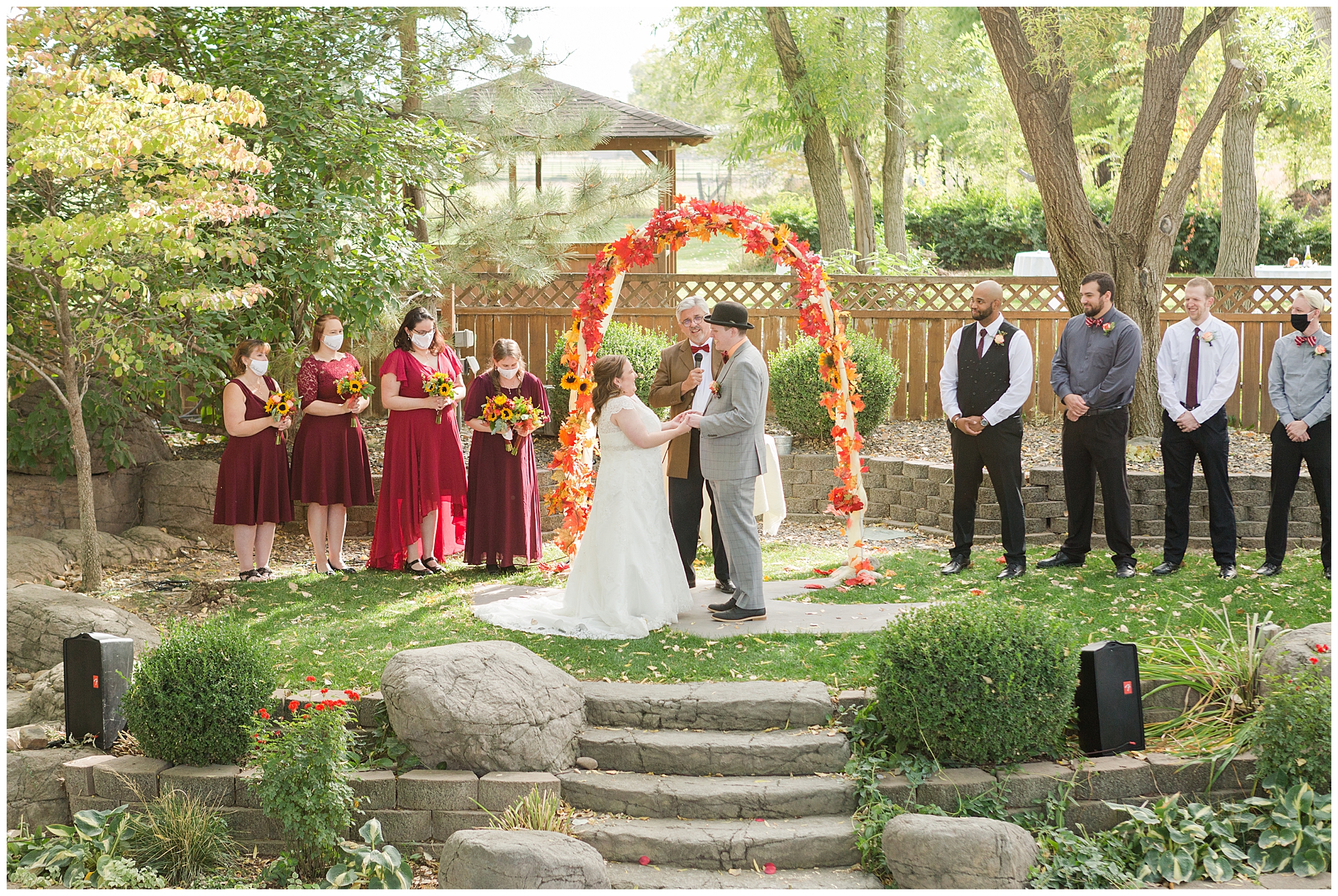 Bride and groom exchanging vows during their autumn wedding ceremony in Nampa, Idaho