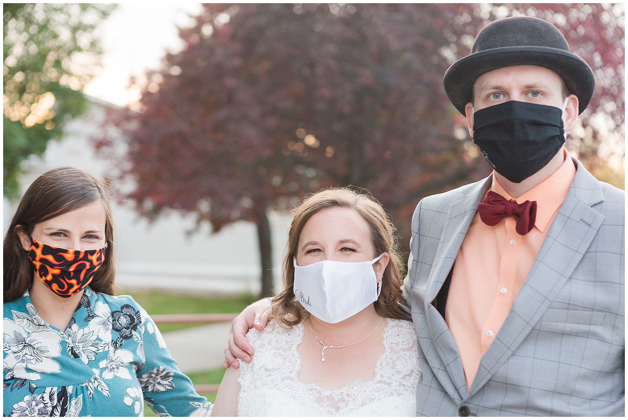 Bride and groom with their photographer, Robin Wheeler