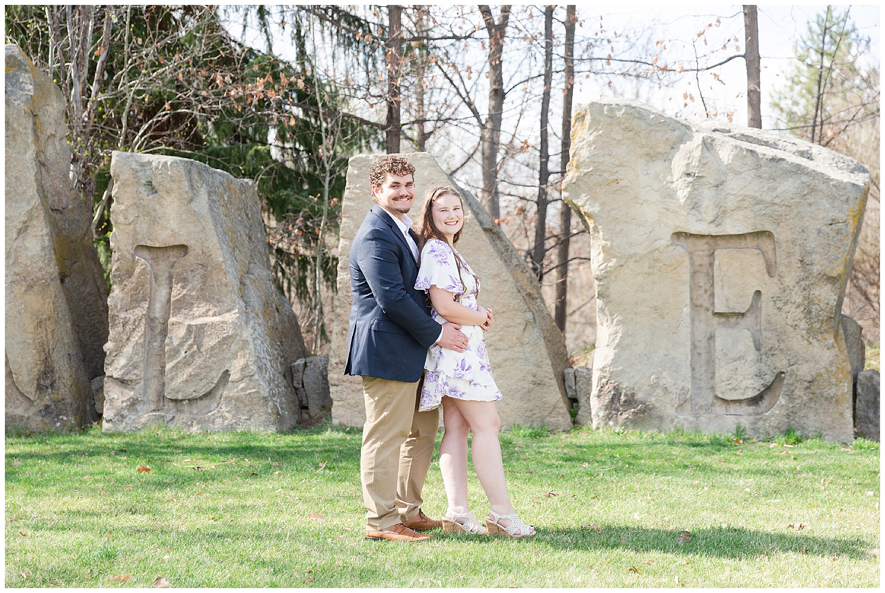 The couple stand between two large stones with L and E on them, corresponding to their own first initial, outside Kathryn Albertson Park in Boise, Idaho