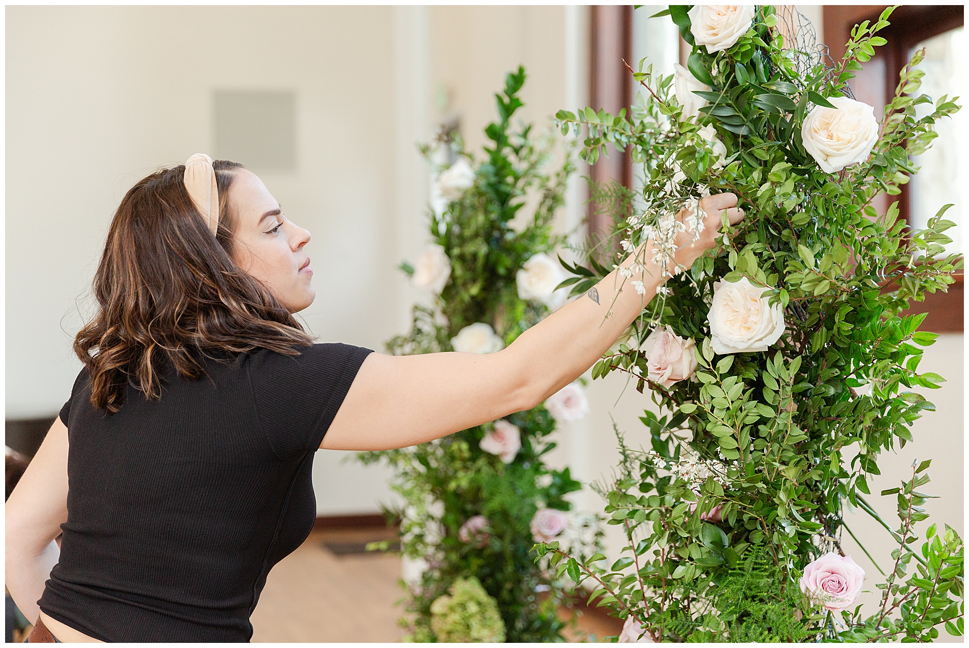 The florist adjusts a spring in an installation