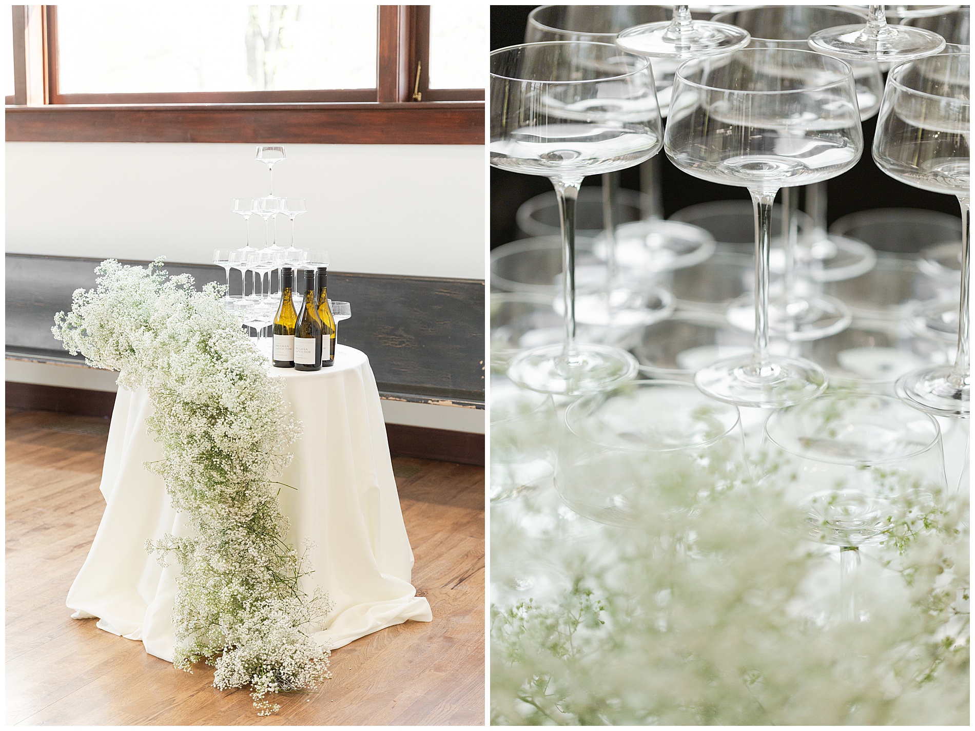 Champagne glasses stacked in a tower with baby's breath flowers cascading over the table and down to the floor; close up on the glasses stacked