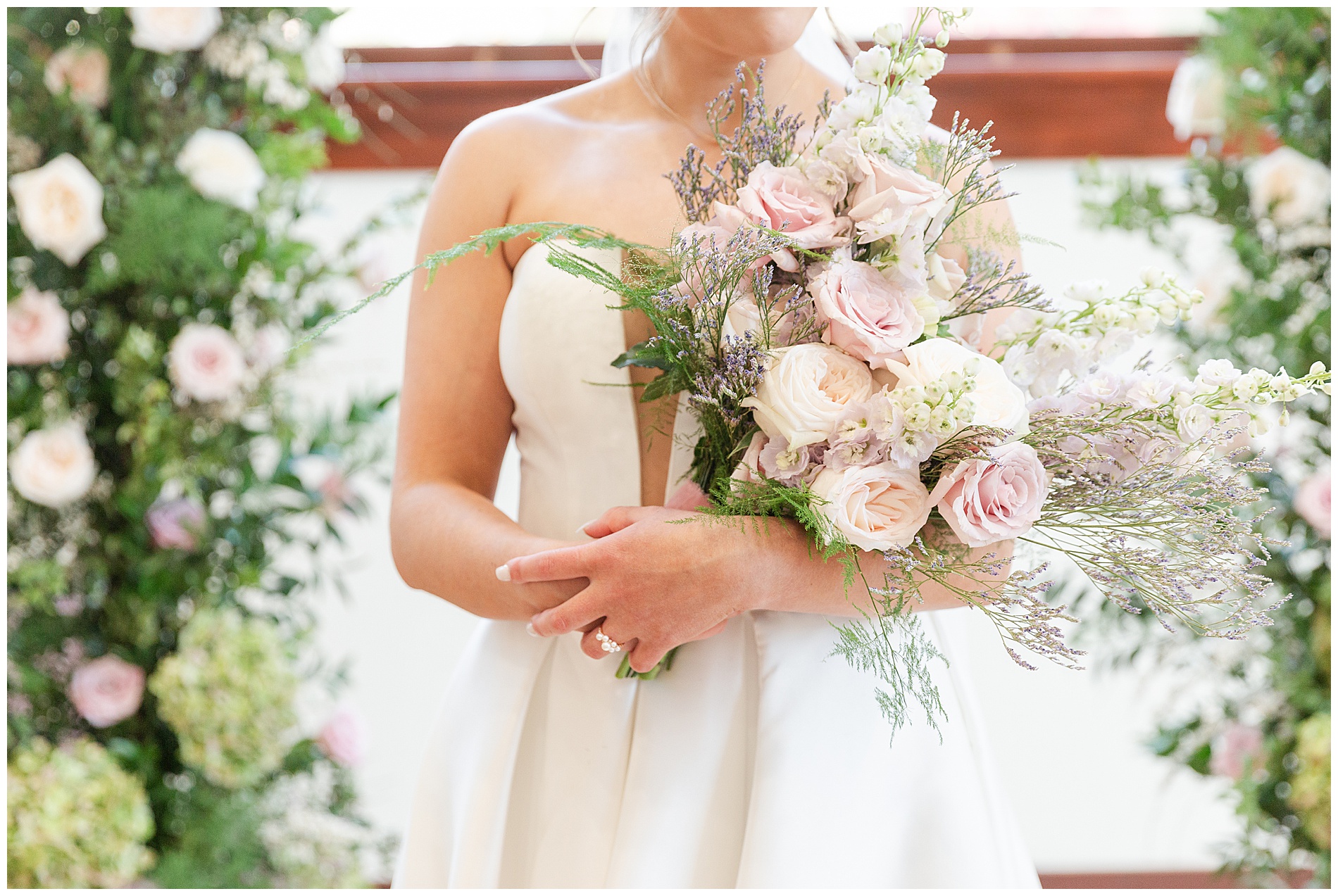 The bride's bouquet in her arms