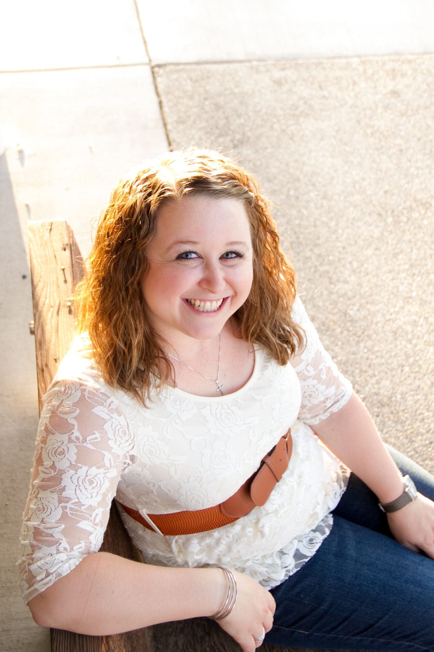 A girl on a bench in downtown Ontario