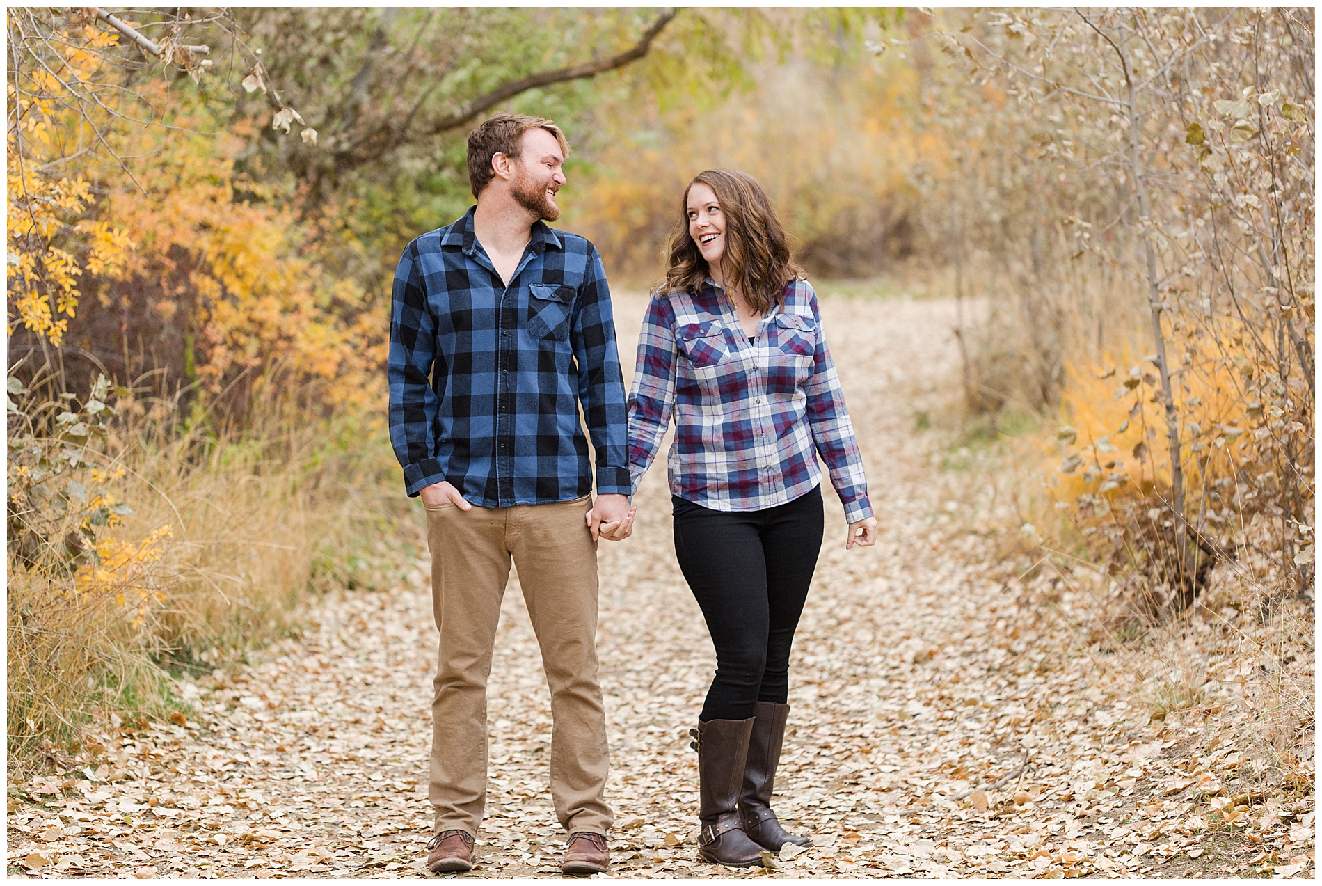 Engagement photos with autumn leaves in Boise's Military Reserve