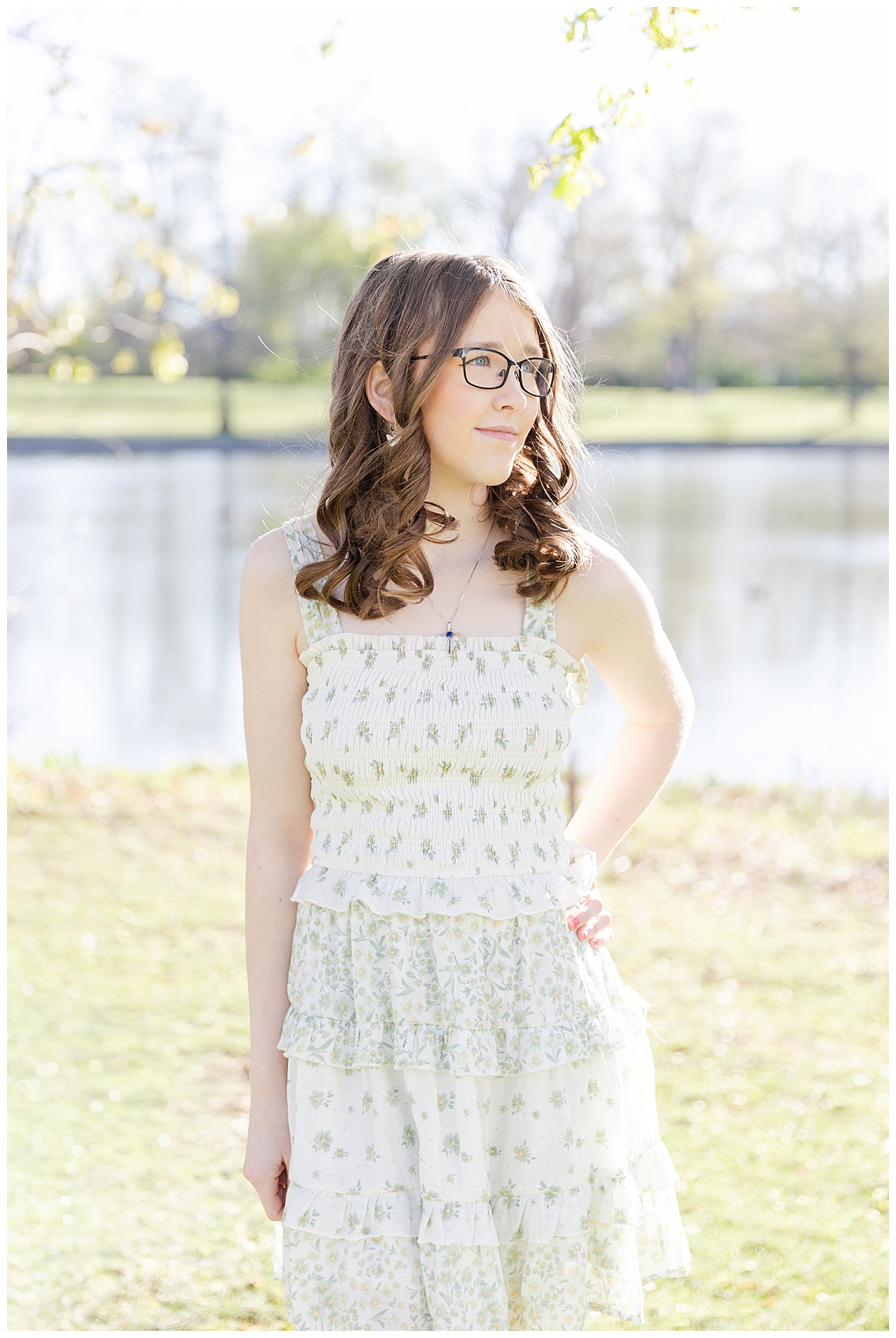 Senior girl in a sundress near the pond at Julia Davis Park