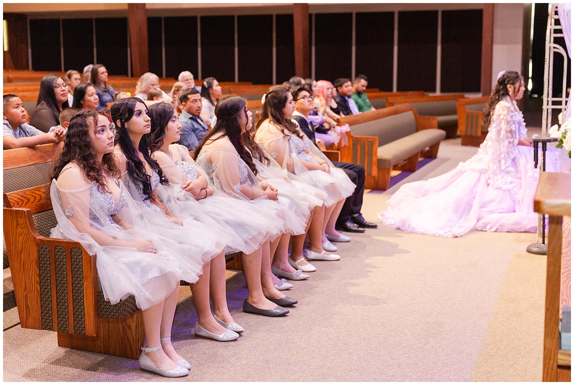 Damas sitting on the pews during the service