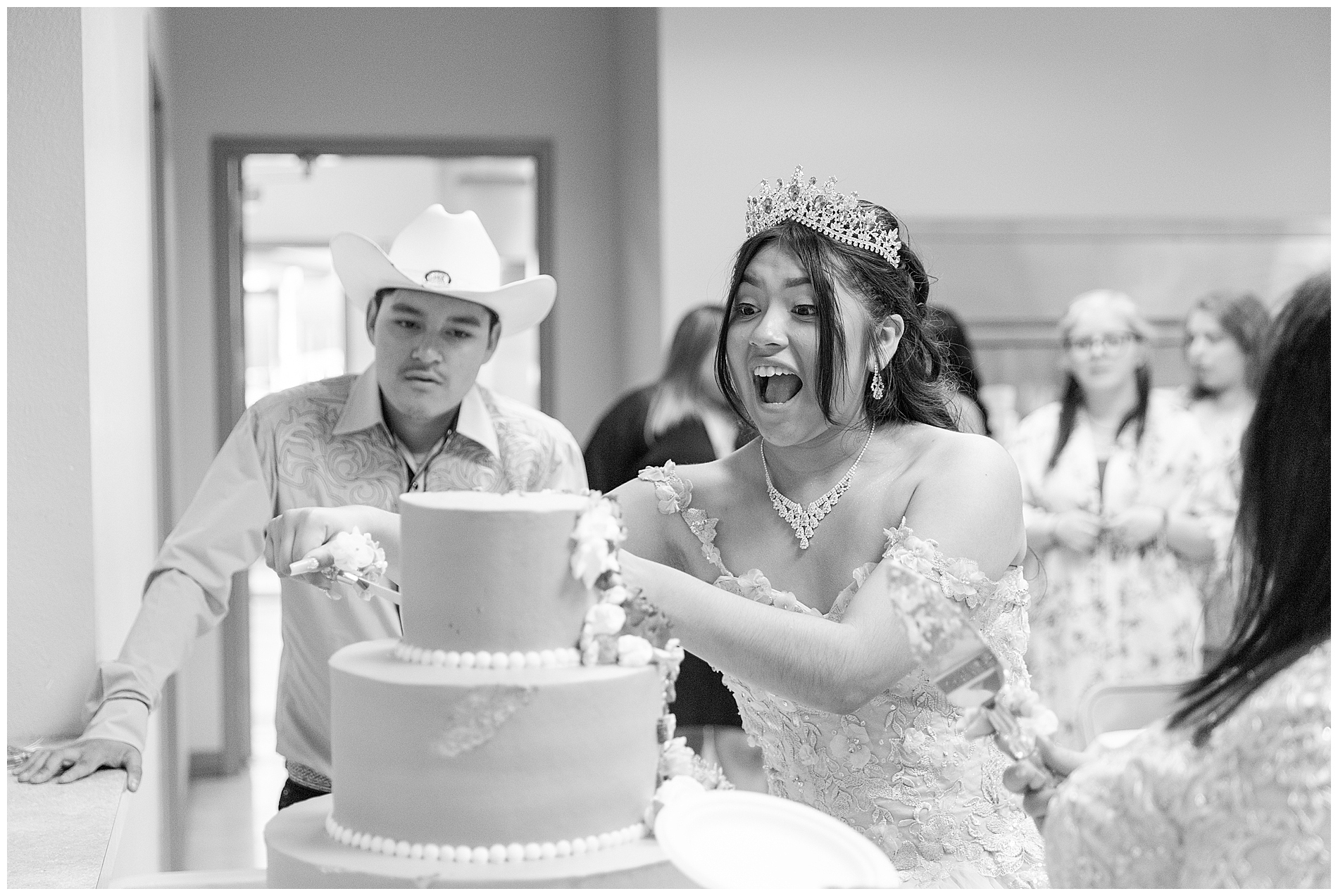 Ana nervously cuts into the next layer of her cake